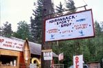 Roadside sign for Adirondack Sport Shop on Route 86, no date.