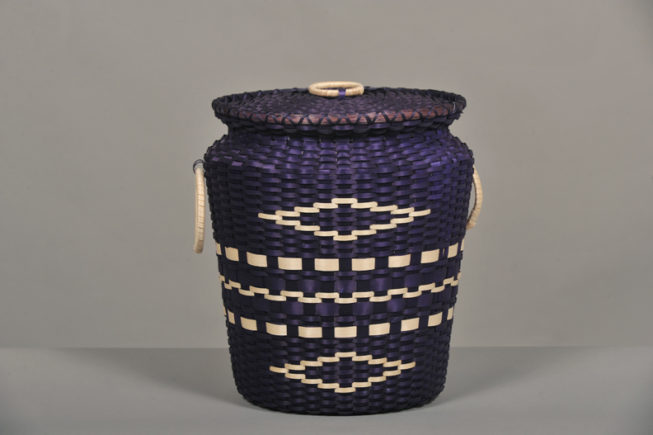 Woven and dyed covered splint basket by Shirley Thompson, 2011. Photographer unknown.