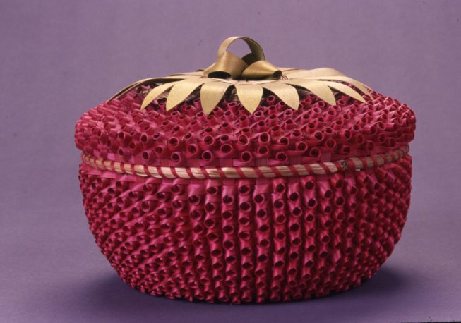 Strawberry Basket, a kind of ash splint and sweetgrass fancy basket, made by Akwesasne Mohawk basket maker. Date and photographer unknown.