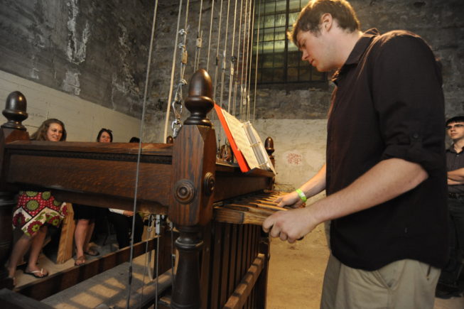 Alex Merrell playing the chimes, 2013.