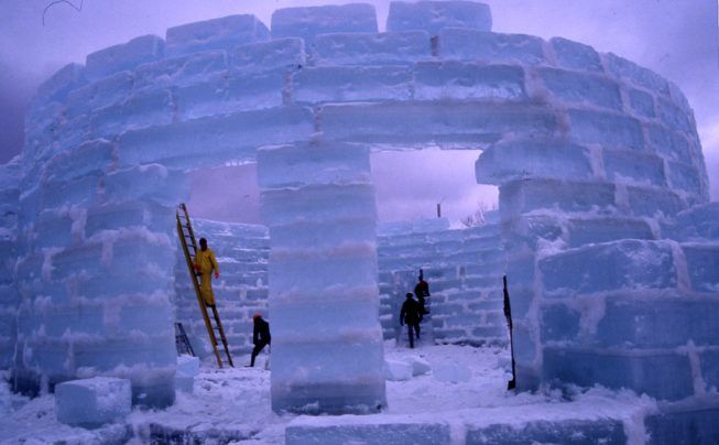 The Winter Carnival Ice Palace under construction, 1997. Over the years, palaces have been built with 1,000 to 4,000 ice blocks (generally 2'x4'), with parts rising up to 60 feet tall, weather and ice allowing.