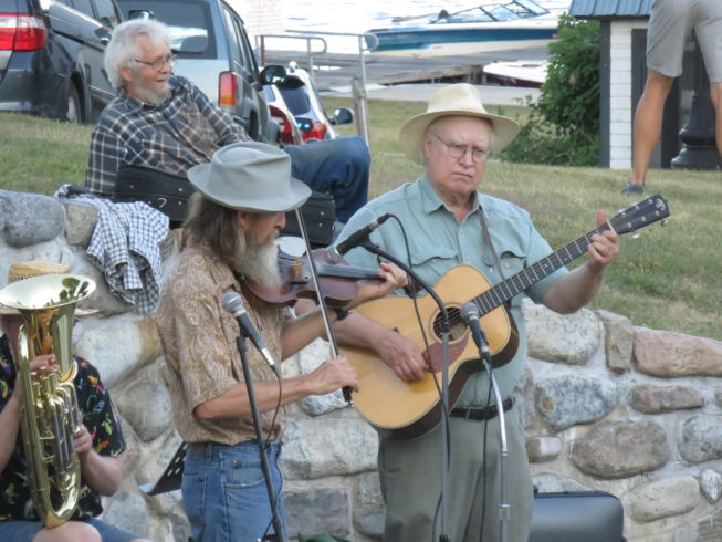 Callers play a mixed repertoire at the square dance, 2012.