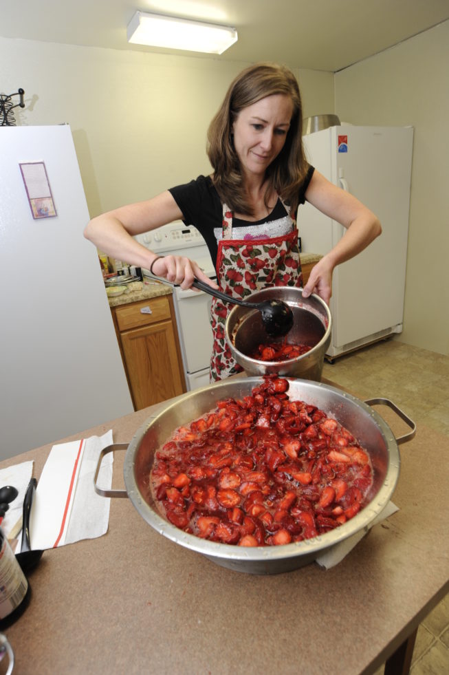 Prepping strawberries for the festival, 2013.