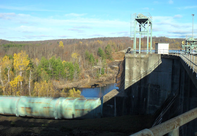 The Niagara Mohawk Foundation was recognized in 1997 for providing funding for folk arts programs. Pictured: Rainbow Falls hydroelectric dam and power house facility on the Raquette River in Parishville, NY, 2015. This facility is one of those originally built and run as part of the Niagara Mohawk Power Corporation's Raquette River development in 1955, a project featured through documentation of oral histories for TAUNY's research project and 2017 exhibition Look Down, You'll See Our Tracks: Raquette River Dam Stories.