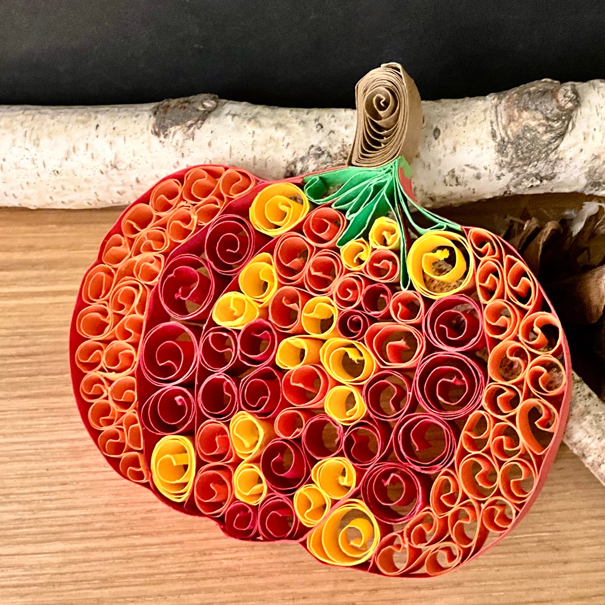 Pumpkin made from multi-colored paper